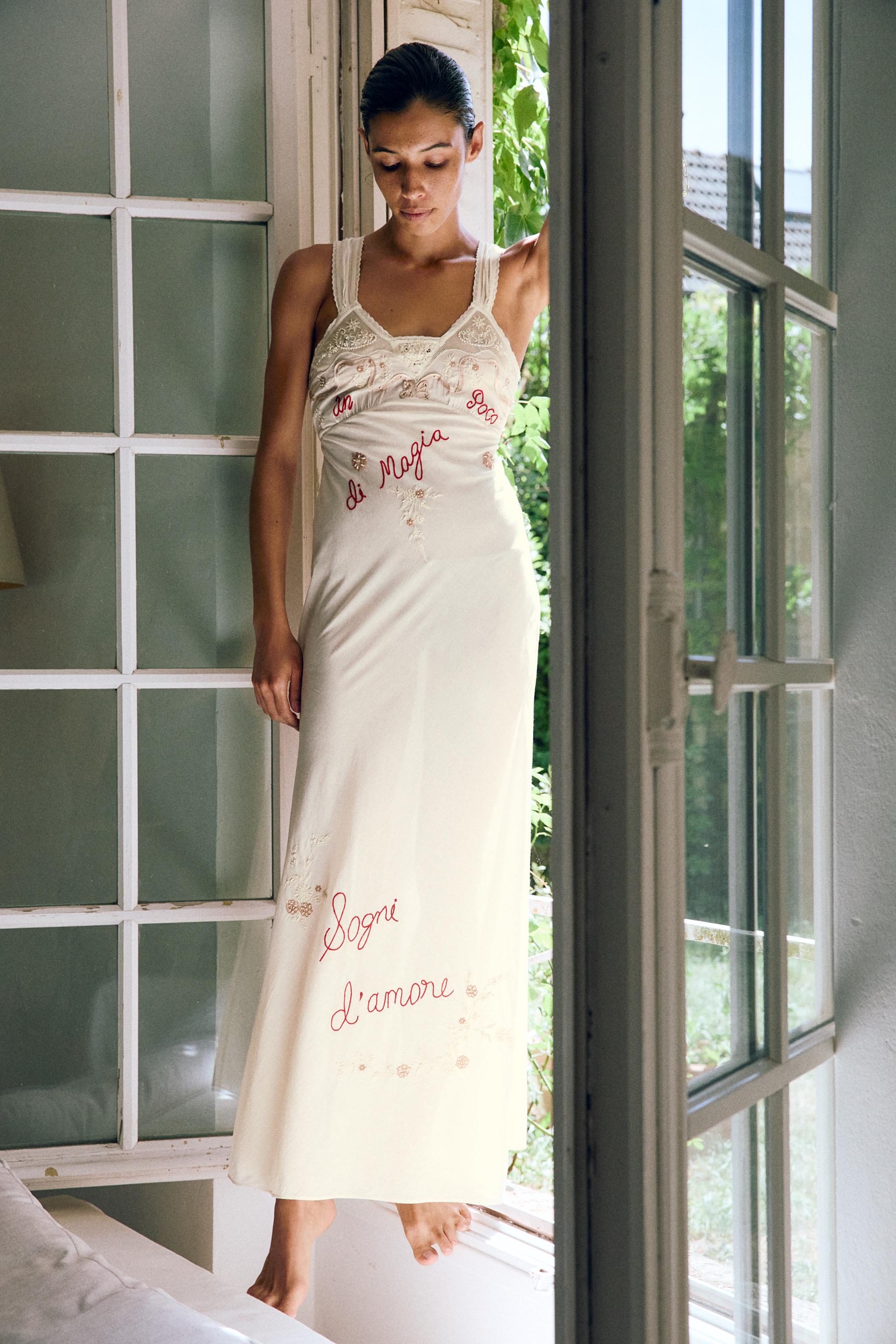DRESS WITH EMBROIDERY, TEXT, AND BEADING